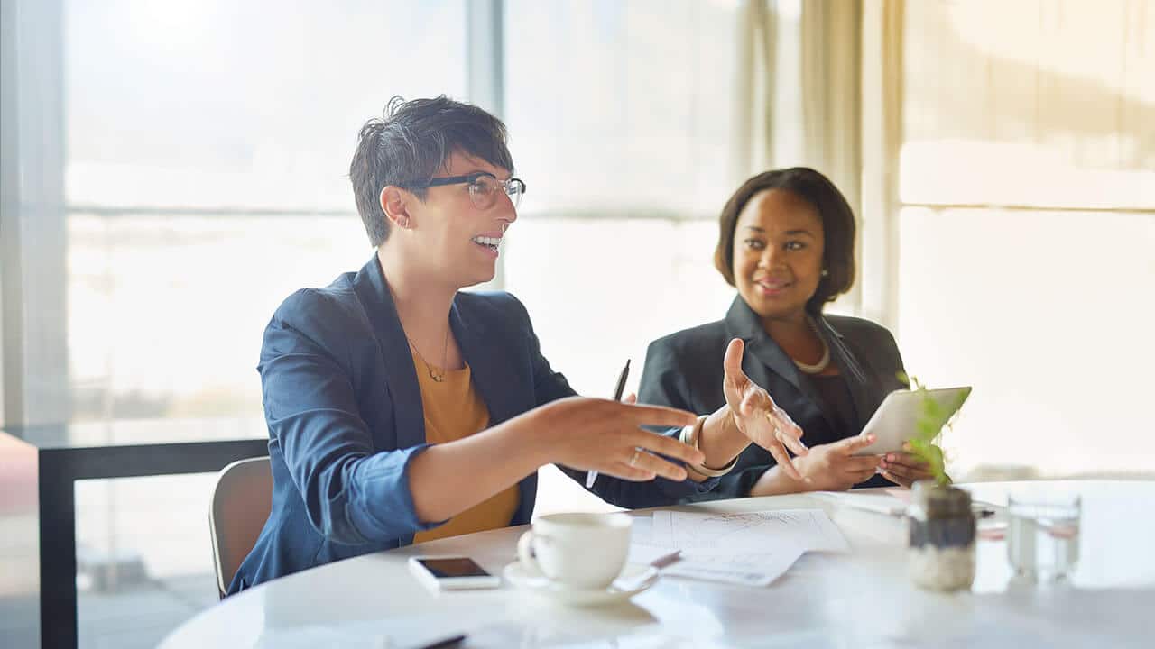 woman gesticulating in meeting