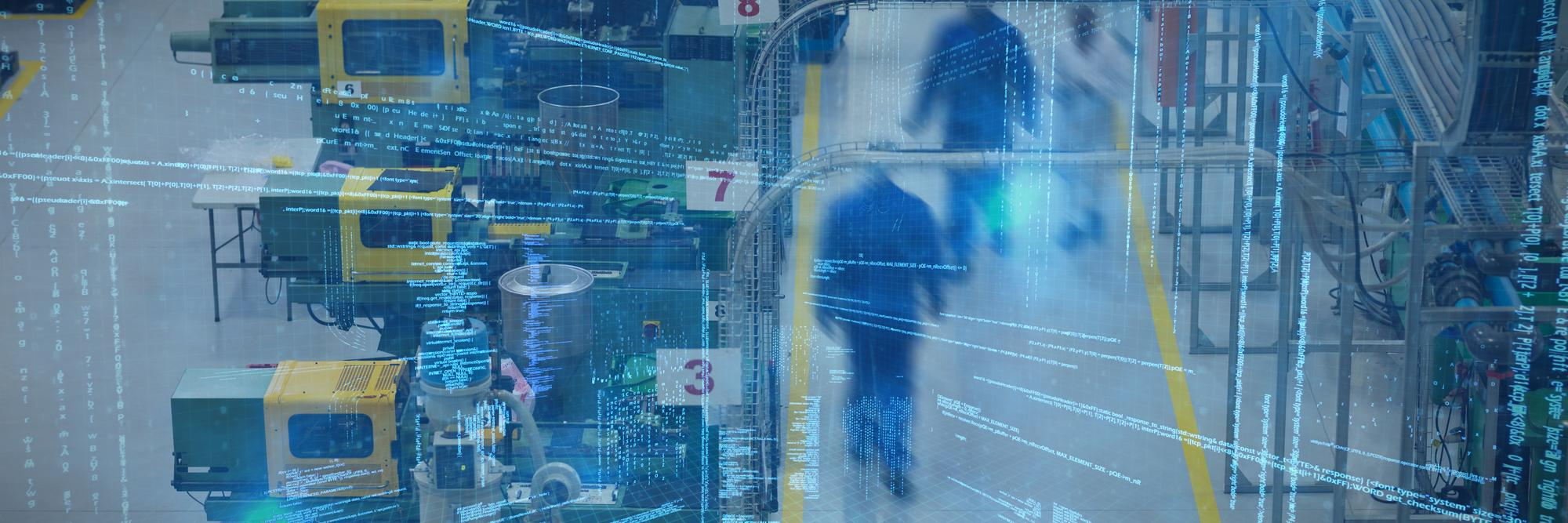 Blurred factory workers walk through a high-tech manufacturing facility overlaid with digital code and data visualisations, symbolising the integration of advanced technology and automation.